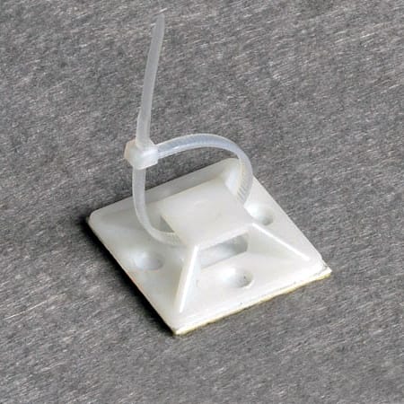Soporte adhesivo de 2.5 cm x 2.5 cm. Blanco x 1 (Unidad)